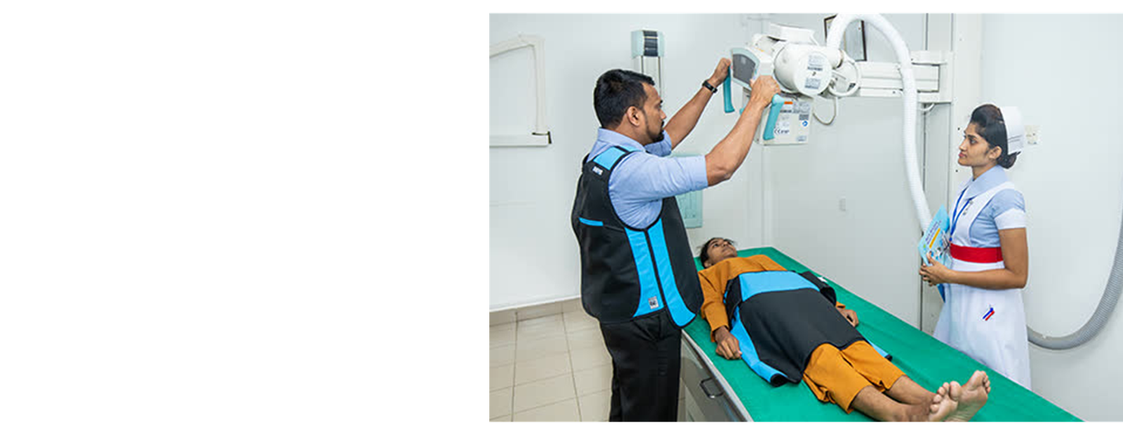 Radiographer reviewing a digital chest x-ray